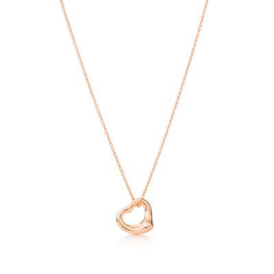 Elsa Peretti® open heart pendant in 18k rose gold, 11 mm. Tiffany & Co.