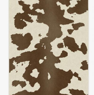 Tan & Ivory Faux Cowhide Rug