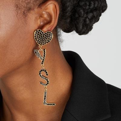 Saint Laurent Opyum logo-embellished clip-on drop earrings