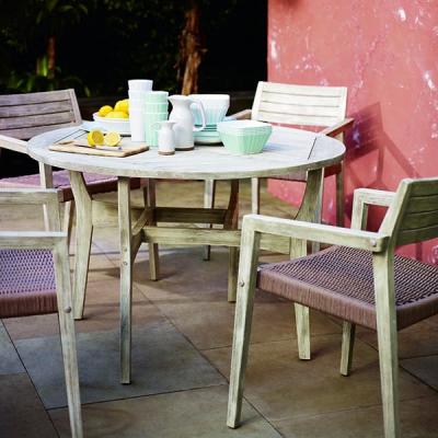 Debenhams Acacia wood 'Mikado' round table and 4 carver chairs