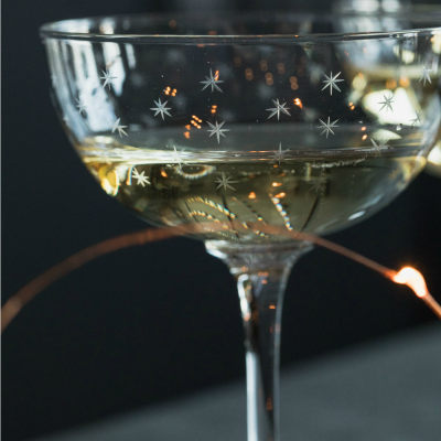 Star Engraved Champagne Glasses at Rose & Grey