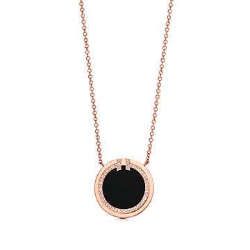 Tiffany T Two diamond and black onyx circle pendant in 18k rose gold. Tiffany & Co.