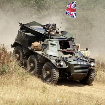 Drive an armoured military vehicle