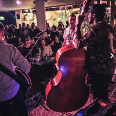 See a live band play