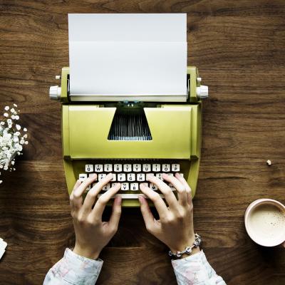 Type a letter on an old type writer