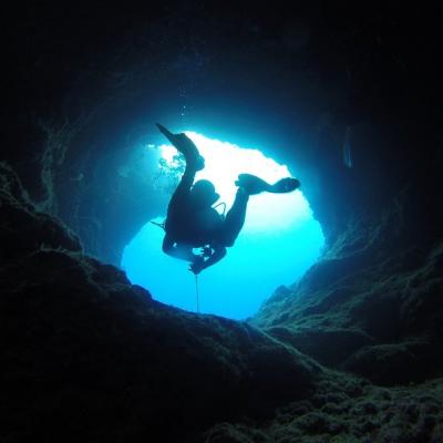 Scuba dive into a cave