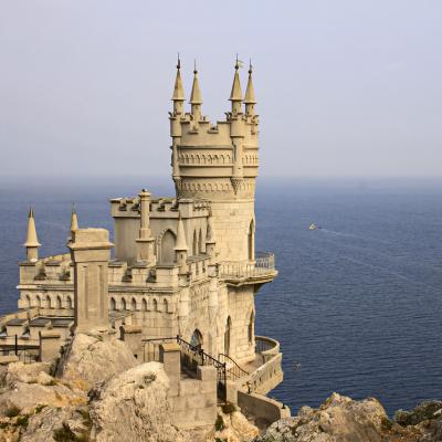 Explore a castle overlooking the sea