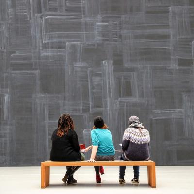 Pretend to apreciate a modern art exhibition