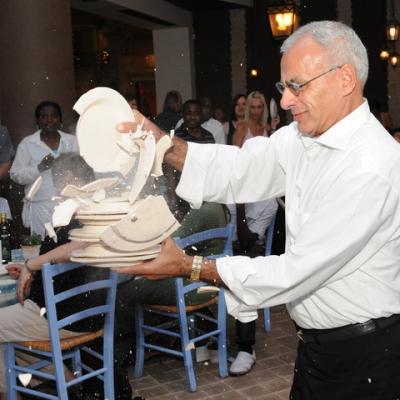 Smash plates in a Greek restaurant