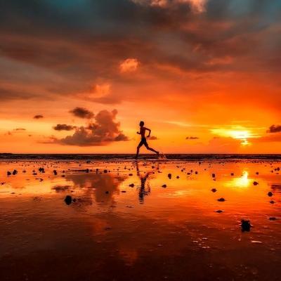 Run on the beach at sunrise