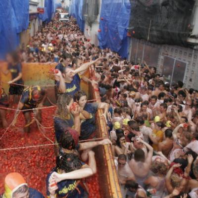 Participate in La Tomatina