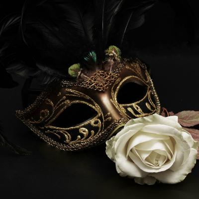 Attend a masked ball
