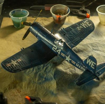 Assemble a miniature model aircraft