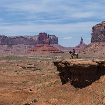 Ride a horse in Monument Valley
