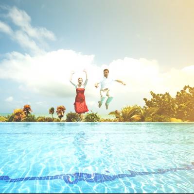 Jump fully dressed into a pool