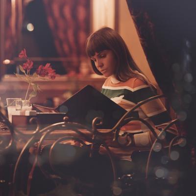 Buy dinner for a stranger at a restaurant