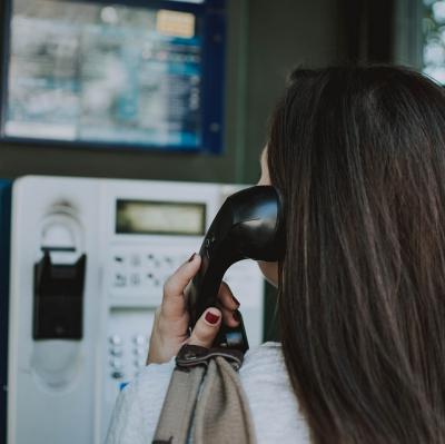Make a call from a public phone box