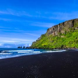 Walk on a black sand beach