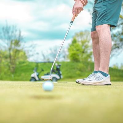 Score a birdie on a golf course