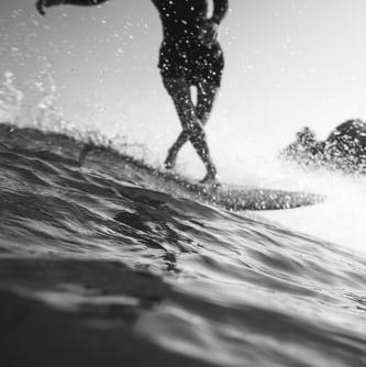 Walk along a surfboard