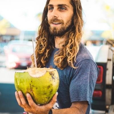 Drink from a coconut in Hawaii