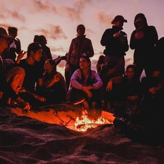 Sit round a campfire