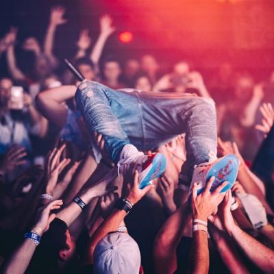 Crowd surfing at a concert