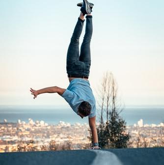 Do a one handed handstand