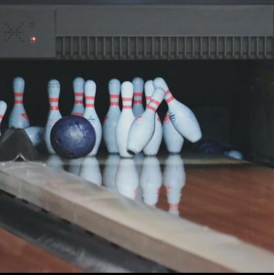 Score a strike at a bowling alley