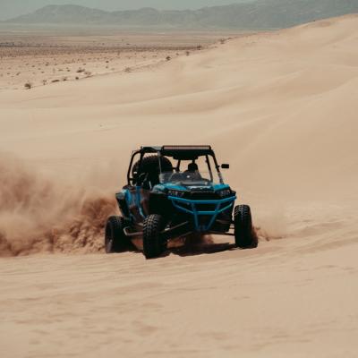 Ride in a dune buggy in the desert