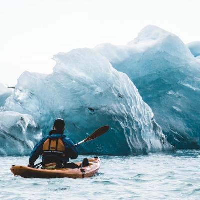 Kayaking through icebergs