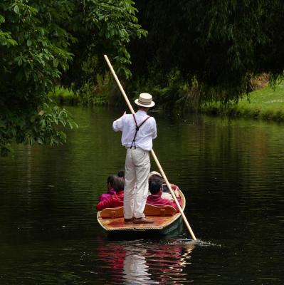Ride along a river in a punt 