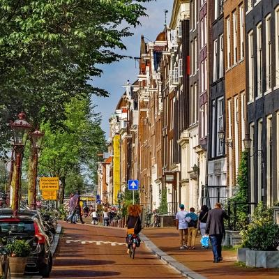 Ride a bicycle in Amsterdam