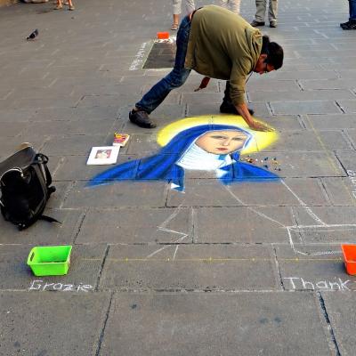 Watch a pavement artist