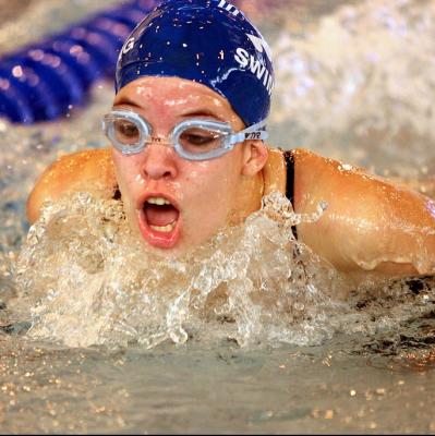 Compete in a swimming gala