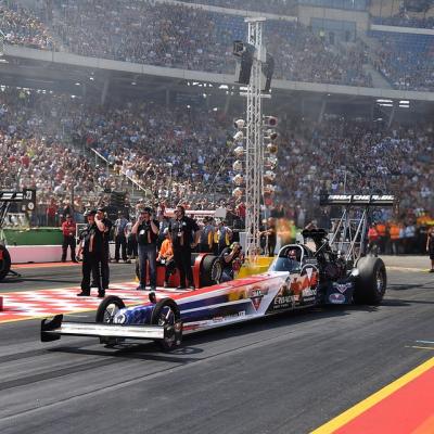 Go to a drag racing meet