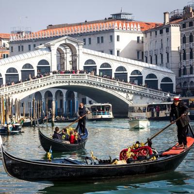 Ride a gondola along he Grand Canal in Venice