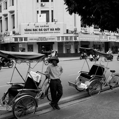 Take a rickshaw ride around Hanoi