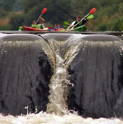 Kayak over a water fall